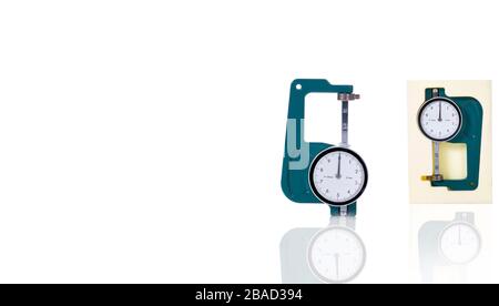 Green thickness gauge isolated on white background. Snap vernier calipers. Measurering tools. Measurement equipment. Measurement of thickness, outer Stock Photo