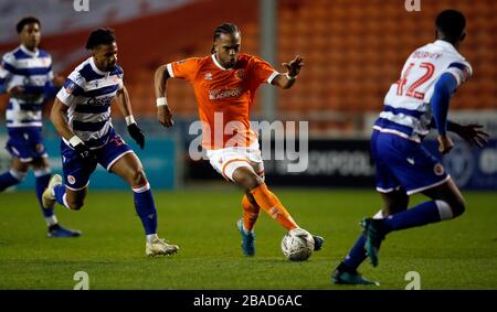 Blackpool's Nathan Delfouneso skips away from Reading's Andy Yiadom Stock Photo