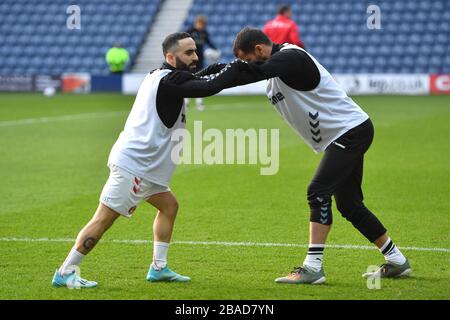 Charlton Athletic's Erhun Oztumer (left) and Tomer Hemed warm up prior to kick off Stock Photo