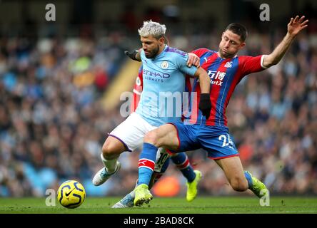 Manchester City's Sergio Aguero (left) and Crystal Palace's Gary Cahill battle for the ball Stock Photo