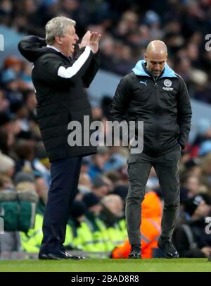 Manchester City manager Pep Guardiola appears dejeteted on the touchline Stock Photo
