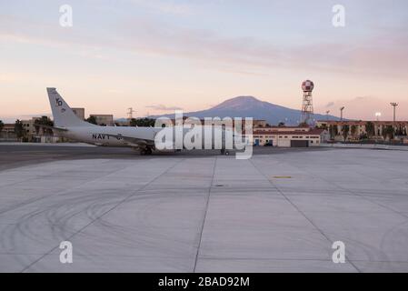 200226-N-CR843-0033 SIGONELLA, Italy (Feb 26, 2020) A Patrol Squadron (VP) 4 P-8A Poseidon aircraft is parked on the apron of Naval Air Station Sigonella with Mt. Etna in the background, Feb. 26, 2020. VP-4 is currently forward deployed to the U.S. 6th Fleet area of operations and is assigned to Commander, Task Force 67, responsible for tactical control of deployed maritime patrol and reconnaissance squadrons throughout Europe and Africa. (U.S. Navy photo by Mass Communication Specialist 2nd Class Juan Sua) Stock Photo