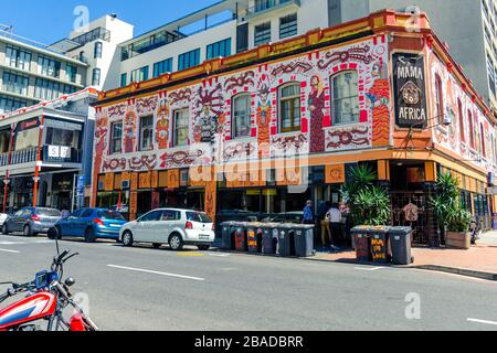 Mama Africa restaurant and live african music venue long street with wheelie rubbish garbage bins outside. Cape Town South Africa Stock Photo