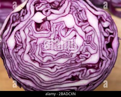 A close up of a sliced purple cabbage Stock Photo