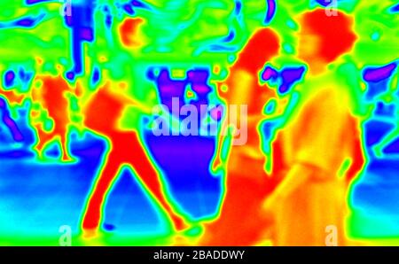 Infrared thermal scanner detecting people who have a high temperature to keep closely monitor. Stock Photo