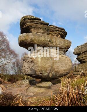 Idol rock, a massive boulder balanced on a small plinth at Brimham Rocks in Nidderdale, North Yorkshire Stock Photo
