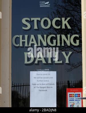 Paignton, Devon, England: Signs around the town warning of the Coronavirus danger, to keep a safe social distance and rainbows in support of the NHS Stock Photo