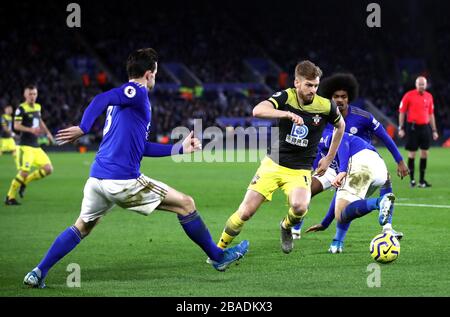 Leicester City's Ben Chilwell (left) and Southampton's Stuart Armstrong battle for the ball Stock Photo