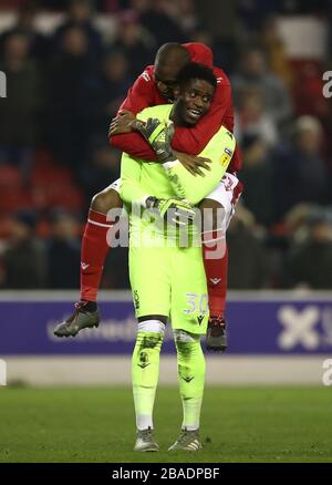 Nottingham Forest's Samba Sow (rear) celebrates after the final whistle with goalkeeper Brice Samba Stock Photo