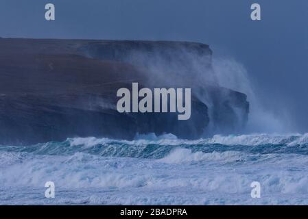 Rough seas and sea spray at Marwick Head, Orkney Isles Stock Photo