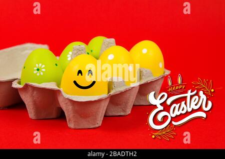 Colorful Easter eggs in a group on a red background Stock Photo
