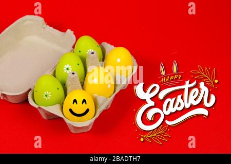 Colorful Easter eggs in a group on a red background Stock Photo