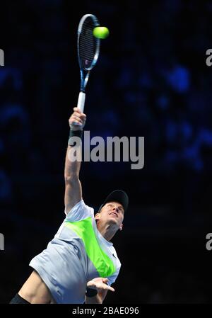 Czech Republic's Tomas Berdych serves to Switzerland's Roger Federer ...