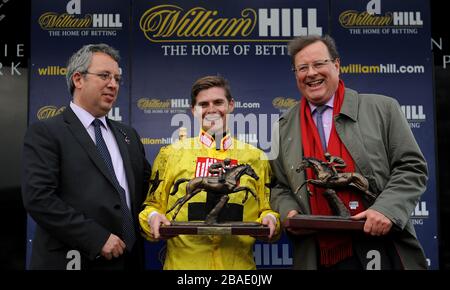 Miss Exhibitionist winning Jockey Fergus Sweeney poses with his trophy ...