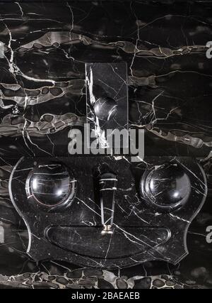 The 19th century marble paperweight on beautiful black marble background. Stock Photo