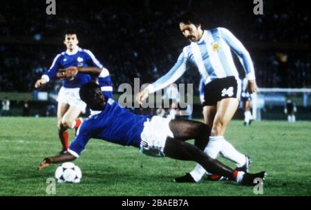 (L-R) Leopoldo Lugue of Argentina is tackled by Marius Tresor of France Stock Photo
