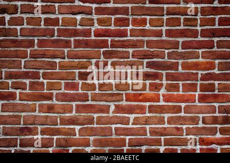 Old Red Brick Wall With White Grout Stock Photo