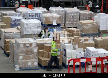 A worker gather supplies at the NHS' National Procurement Warehouse at ...