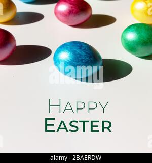 Colorful easter eggs with happy easter word, holiday concept. Happy Easter card. Stock Photo