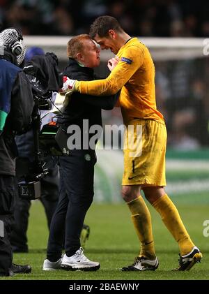 Celtic manager Neil Lennon (left) celebrates with goalkeeper Fraser Forster after the final whistle Stock Photo