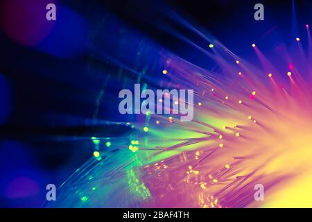 colorful light fiber optic, high speed technology of digital telecommunication for background. Stock Photo