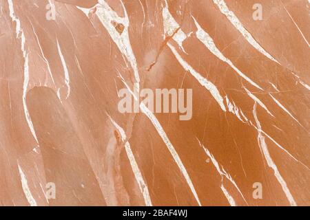Old marble brown wall cement abstract textured for background. Empty rough Yellow Orange Concrete wall. Grunge background marble texture. Grunge image Stock Photo