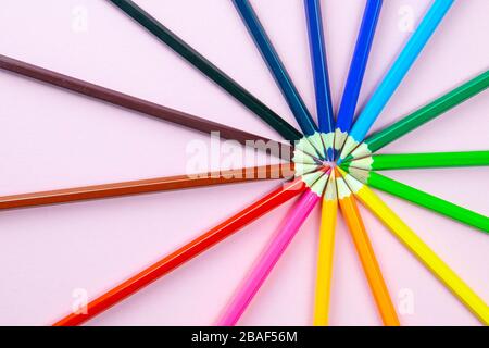 Pastel colored pencils, top view on pink background, illustration concept,  background and education and back to school Stock Photo - Alamy