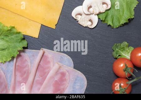 Fresh tasty hamburger ingredients with cheese and mushrooms Stock Photo