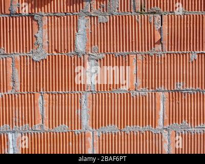 Shell of a brick wall with cement joints Stock Photo