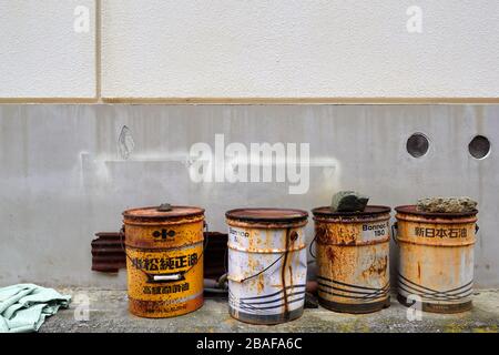 Large rusty metal cans Stock Photo