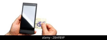 Male hands holding wireless pos terminal and banking card Stock Photo
