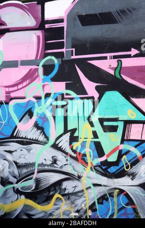 Graffiti. Wall art.  Bold eye catching abstract painting . Decorative, colourful painted wall art. New Zealand Stock Photo