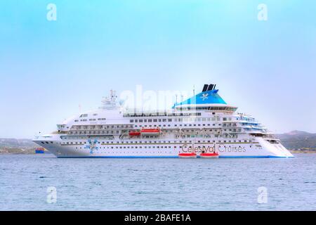 Milos, Greece - April 24, 2019: Celestyal Crystal cruise ship in the Aegean sea Stock Photo