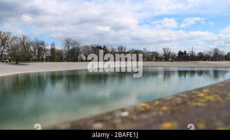 Storm sky over empty Bundek lake in Zagreb due to Corona virus epidemy Stock Photo