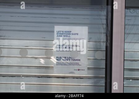 Llandudno Friday 27 March, Social Distancing. Queuing outside supermarkets numbers of shoppers are being limited, as supermarkets are enforcing the two metres rule, also customers are being ask to pay by card to avoid handing cash. Credit : Mike Clarke/ Alamy Live News Stock Photo