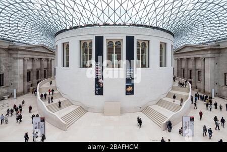 British Museum atrium, London. Wide angle view of visitors in the Great Court of the Sir Norman Foster designed museum.