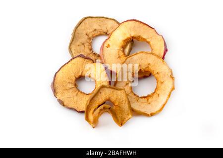 Oven dried crispy apples on a white background Stock Photo