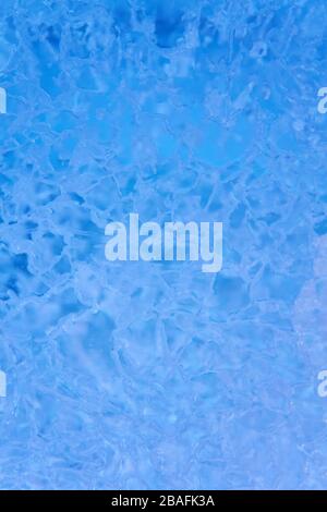 abstract blue ice cracked natural background, glacier wall Stock Photo