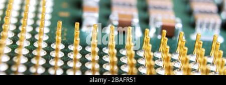 The micro elements of computer central processor unit, CPU contact pins close up. Stock Photo