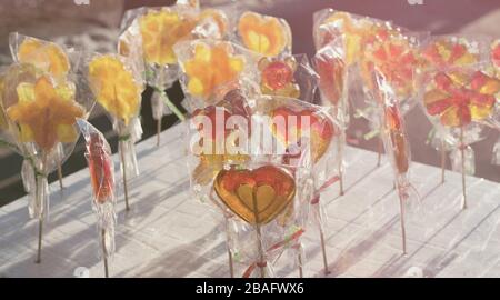 Tasty colorful lollipops on the counter fair, beautiful background Stock Photo
