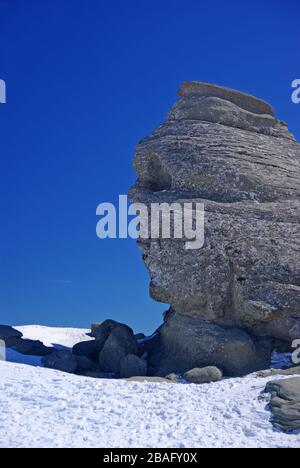 Natural rock formation like a human face in Romanian Carpathians, natural monument Stock Photo