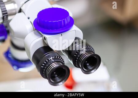 Close up photo of binocular dental microscope. Stock Photo