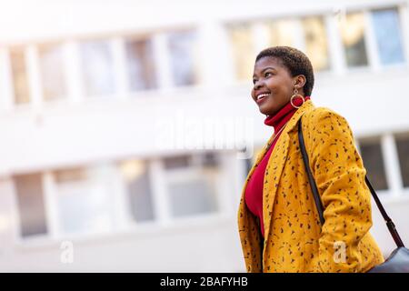 Afro american woman in an urban city area Stock Photo