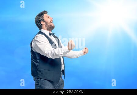 a successful posing businessman against an abstract background Stock Photo