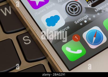 Salesforce mobile app is seen on a smartphone. The enterprise-class app provides users with instant access to CRM data from a mobile device. Stock Photo
