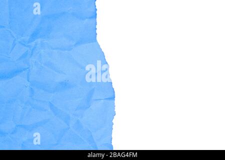 White ripped papper and blue crumpled background Stock Photo