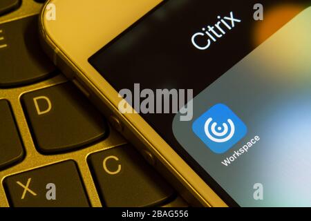 Citrix Workspace mobile app icon closeup. The cloud based platform lets users access SaaS, web apps, mobile, virtual apps, files, desktops on the go. Stock Photo