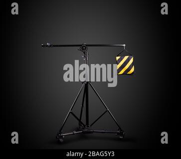 Studio lighting stands isolated on the black background with clipping ...
