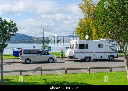 Tauranga New Zealand - March 27 2020; Tourists with nowhere to go for four weeks but  stuck in a  parking area while covid-19 lockdown and isolation r