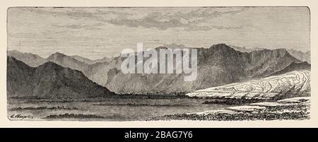 Panoramic view Martand Valley and view of the Himalaya Mountains near Islamabad, India. Trip to Punjab and Kashmir by Guillaume Lejean. Old engraving Stock Photo